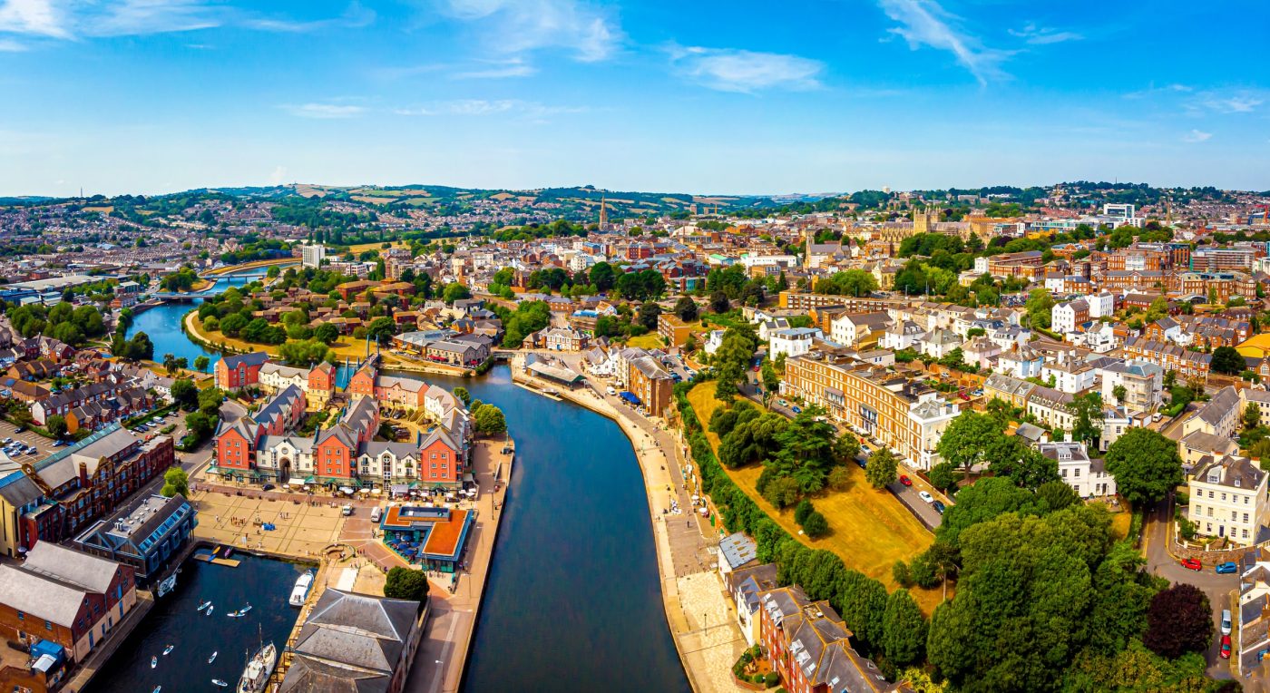 Aerial view of a town with a river.
